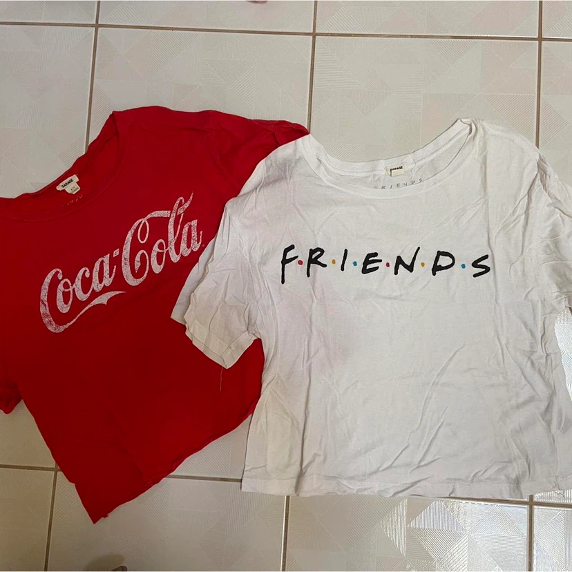 Cropped Garage T-Shirts - Coca-Cola & Friends