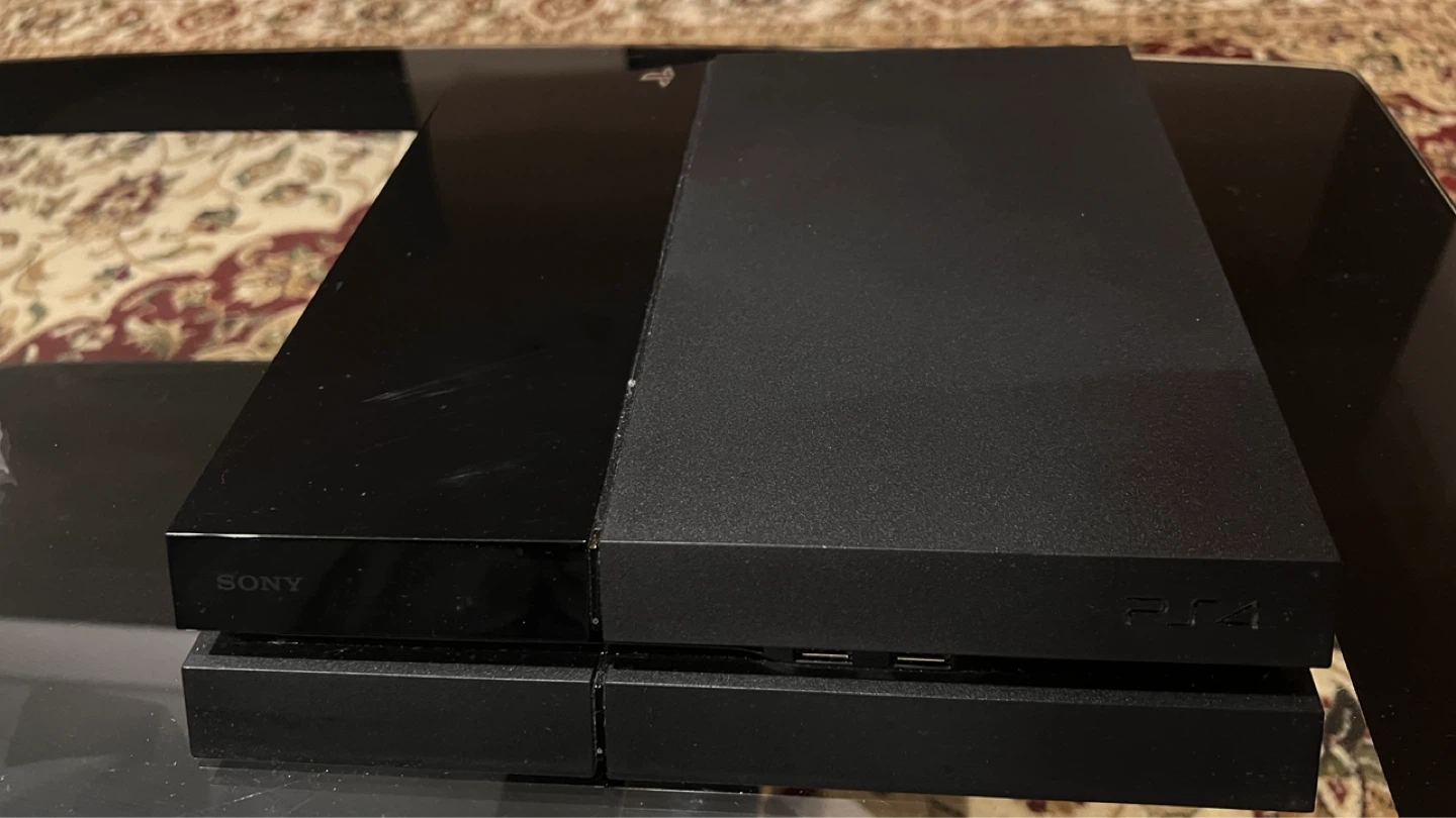 Sony PlayStation 4 with Dualshock 4 and Power Cable