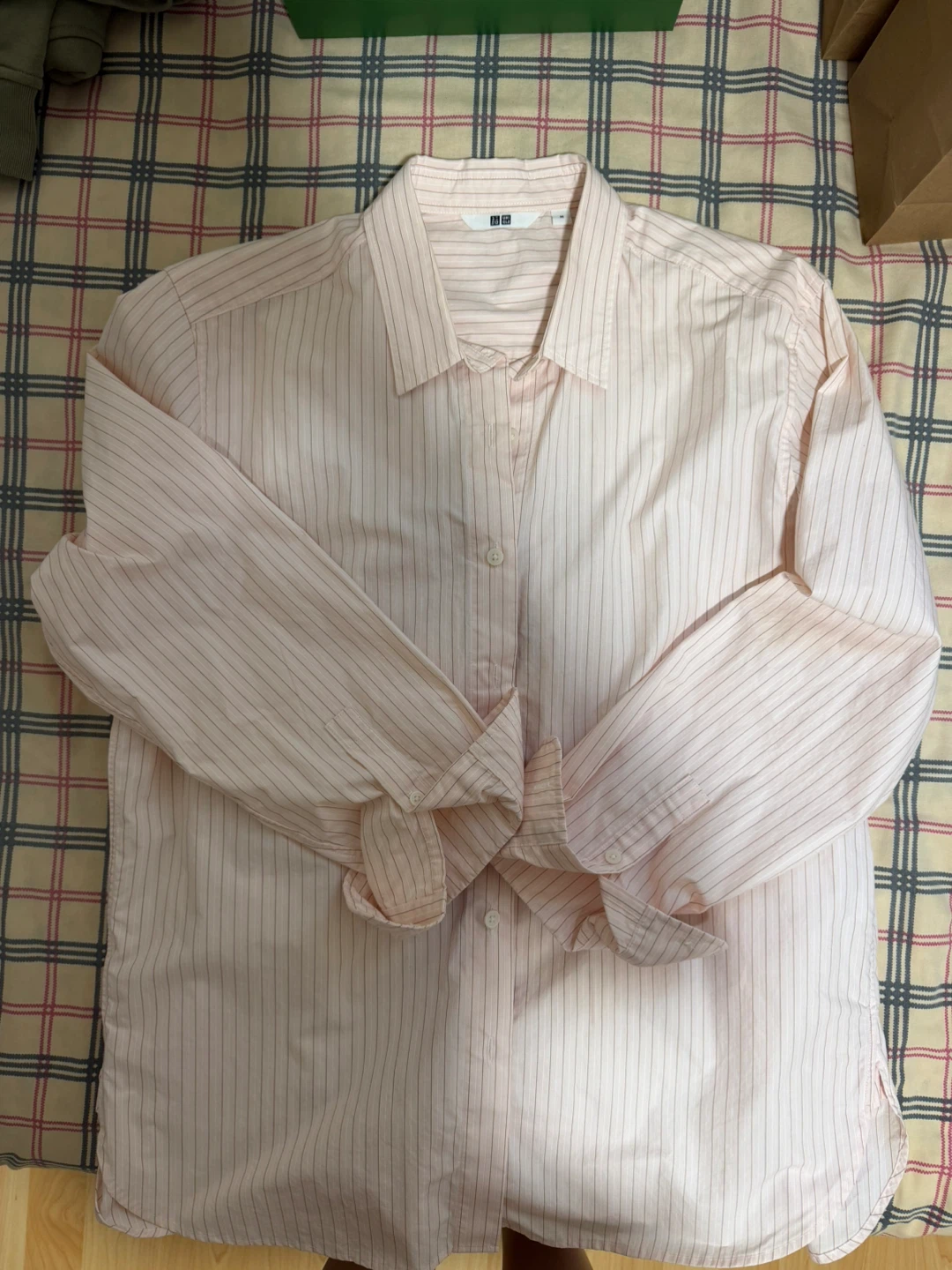 Various Uniglo shirts and Tommy polo