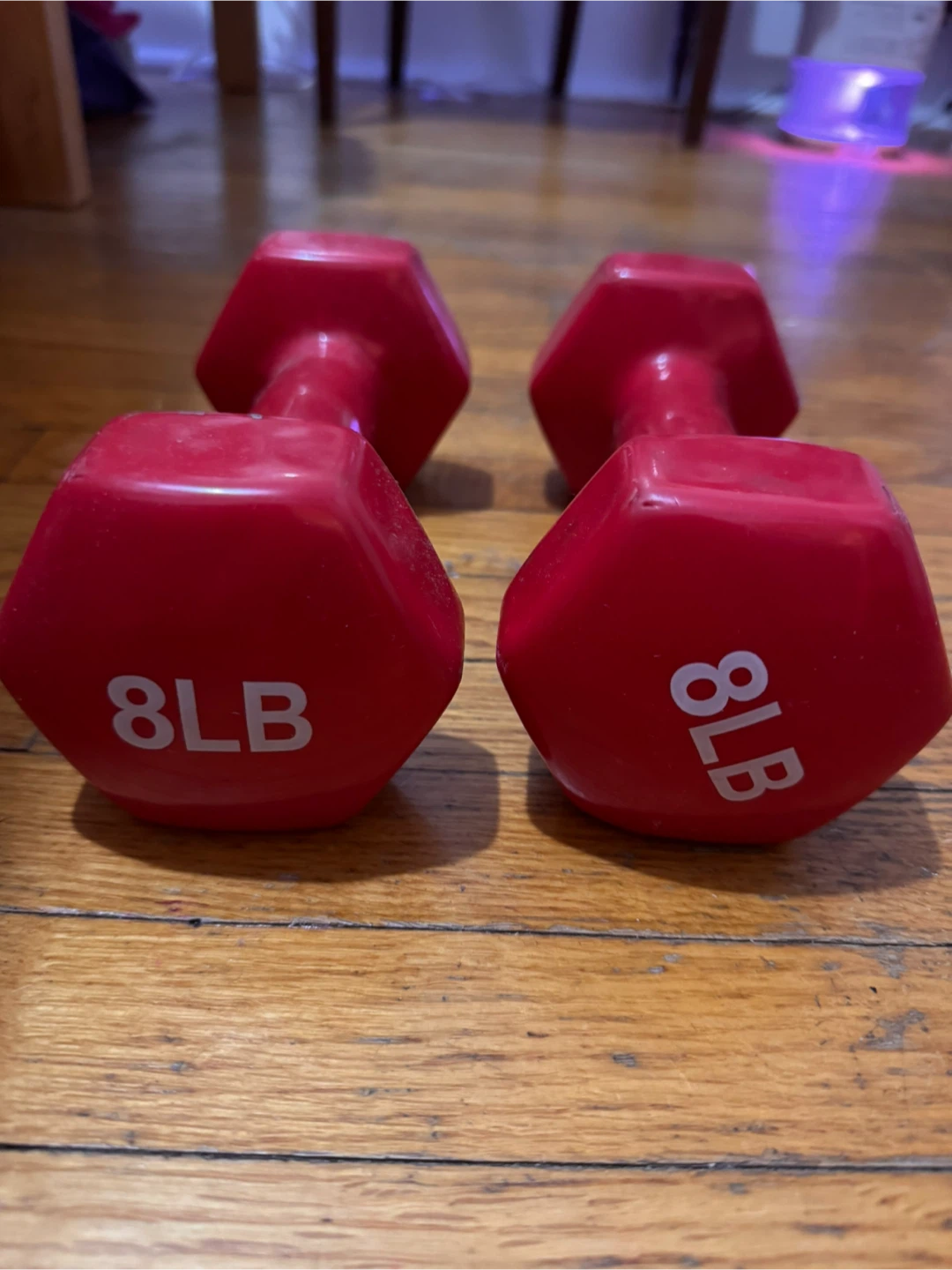 Pair of red 8lb dumbbells