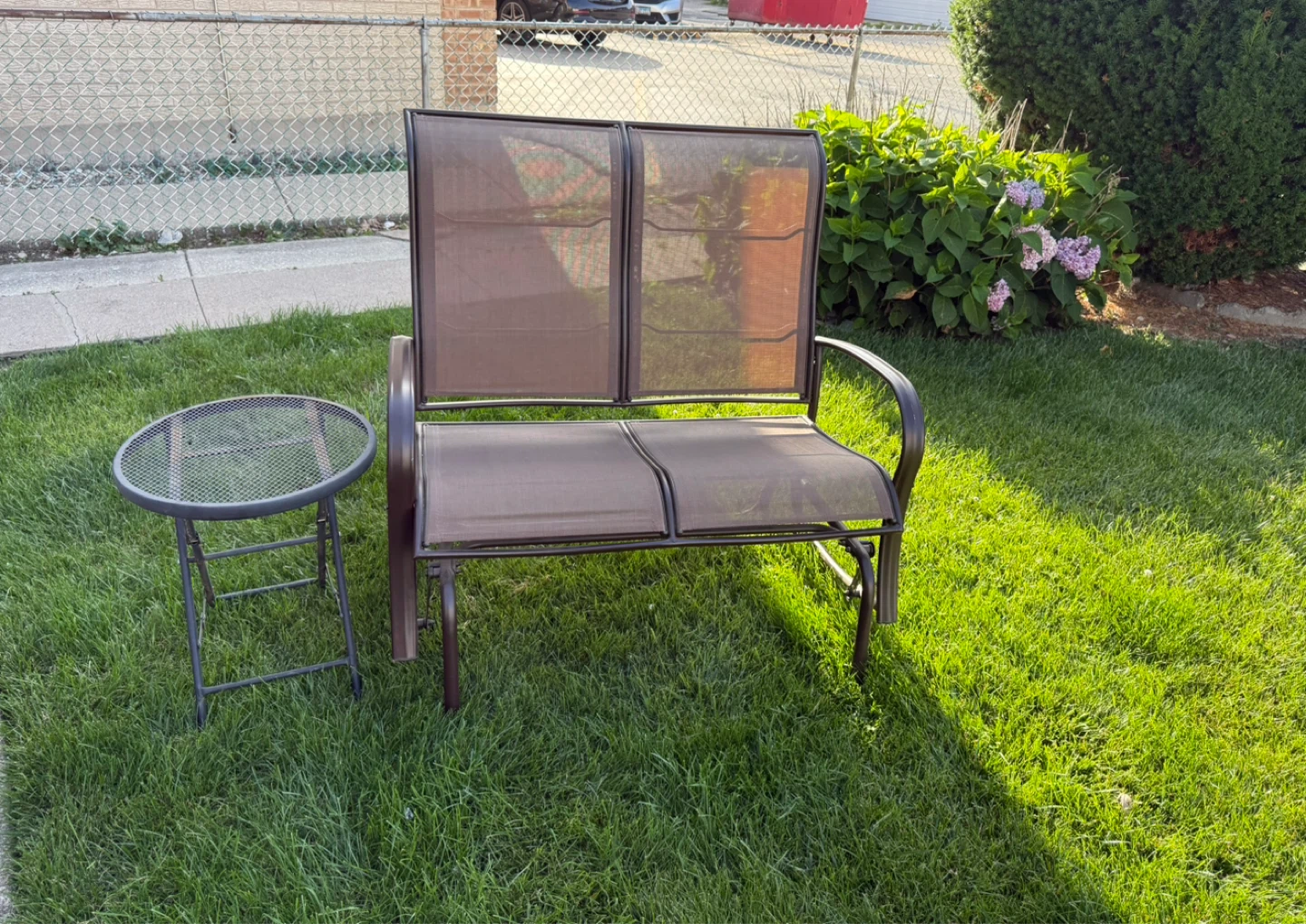 Bronze Metal Glider with Side Table. $130.00 or best offer