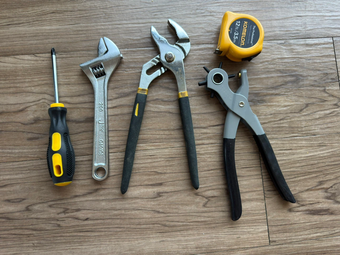 Assorted Tools: Stanley Pliers, Wrench, Screwdriver, Hole Punch