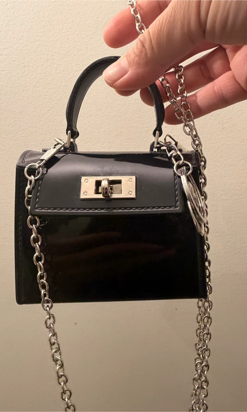 Black patent mini handbag with silver chain