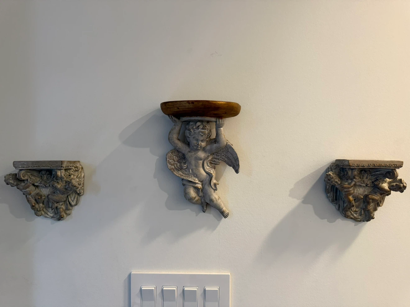 Cherub wall shelves
