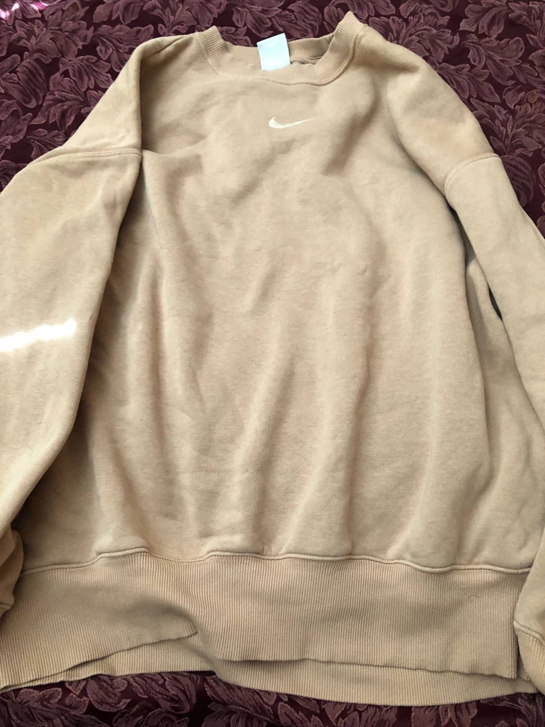 beige Nike sweater