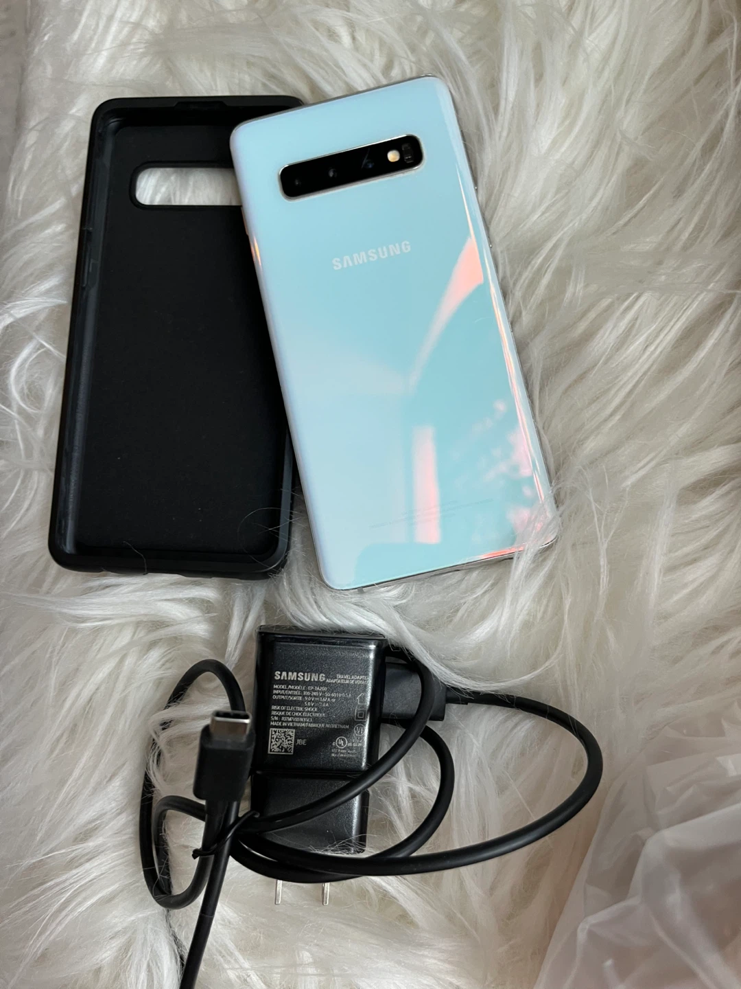 Samsung Galaxy S10 Smartphone with Charger and Case