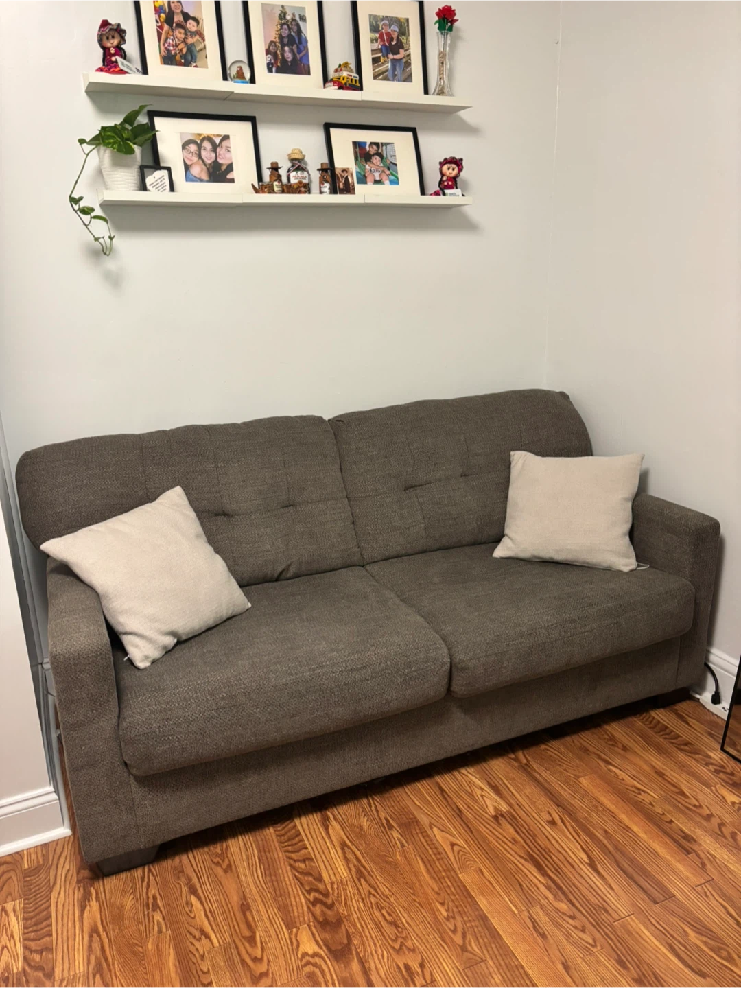 Gray Upholstered Sofa with Pillows