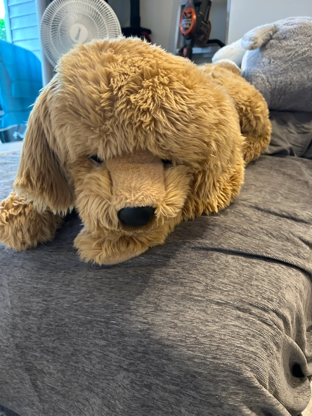 Large stuffed brown dog