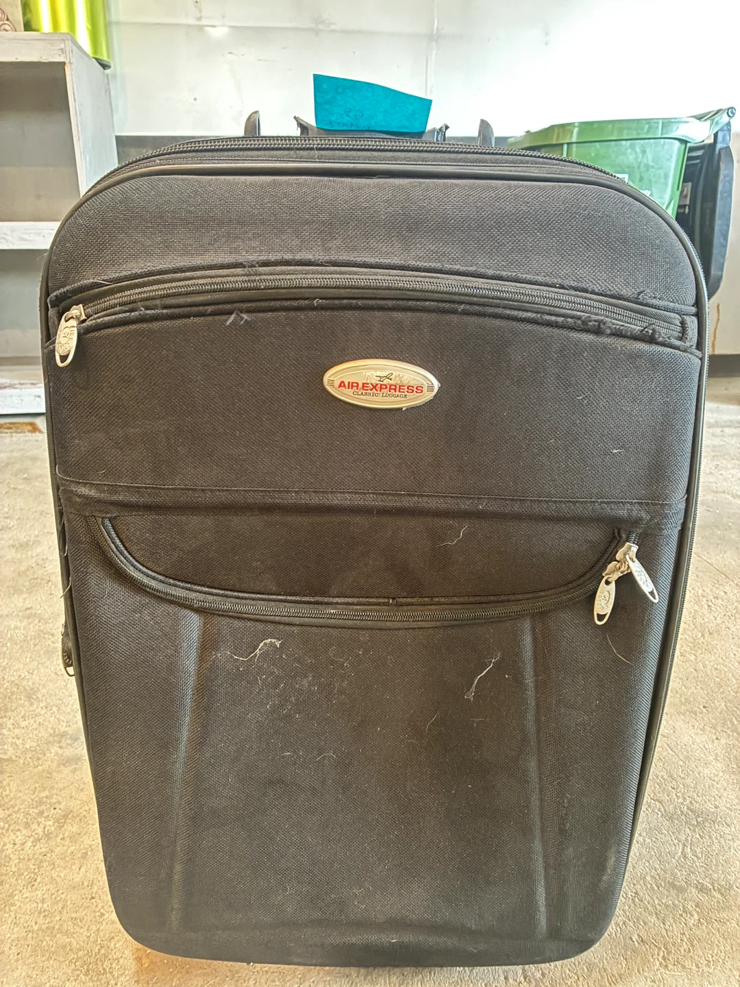Air Express Classic Black Rolling Suitcase