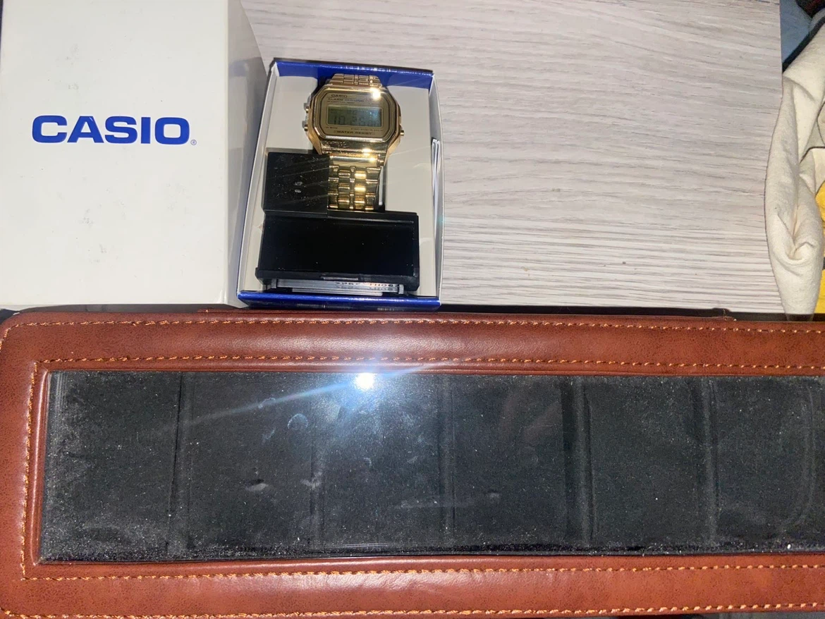 Casio Gold watch and leather case