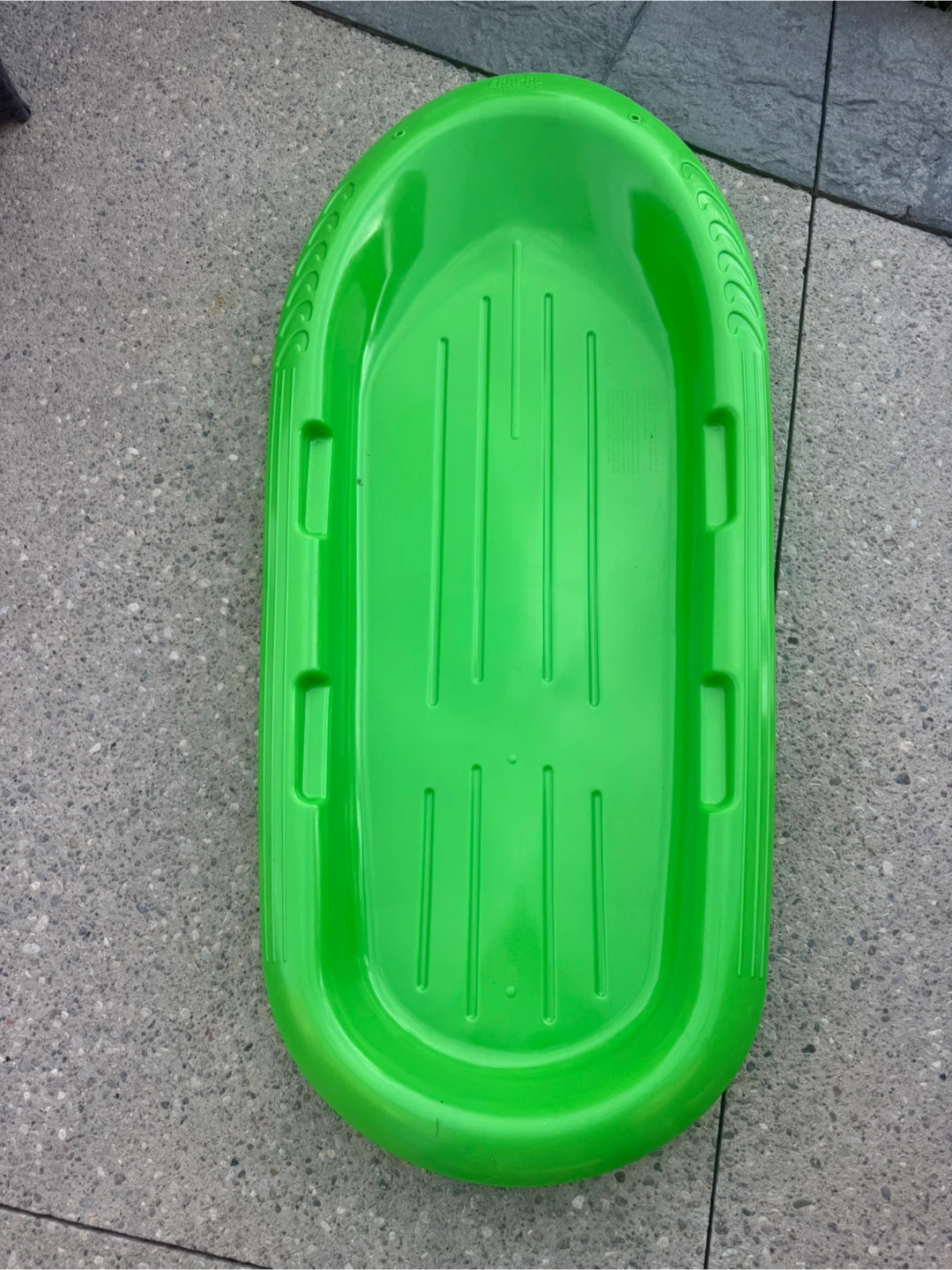 Bright Green Plastic Toboggan Sled