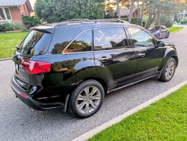 Black Acura MDX SUV - photo 3