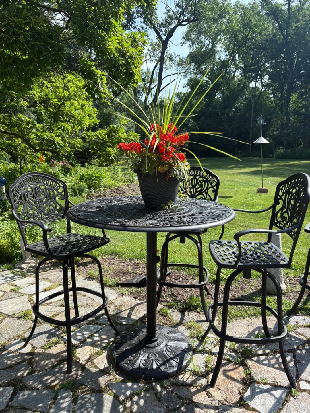 Cast aluminum round bistro table and 3 chairs