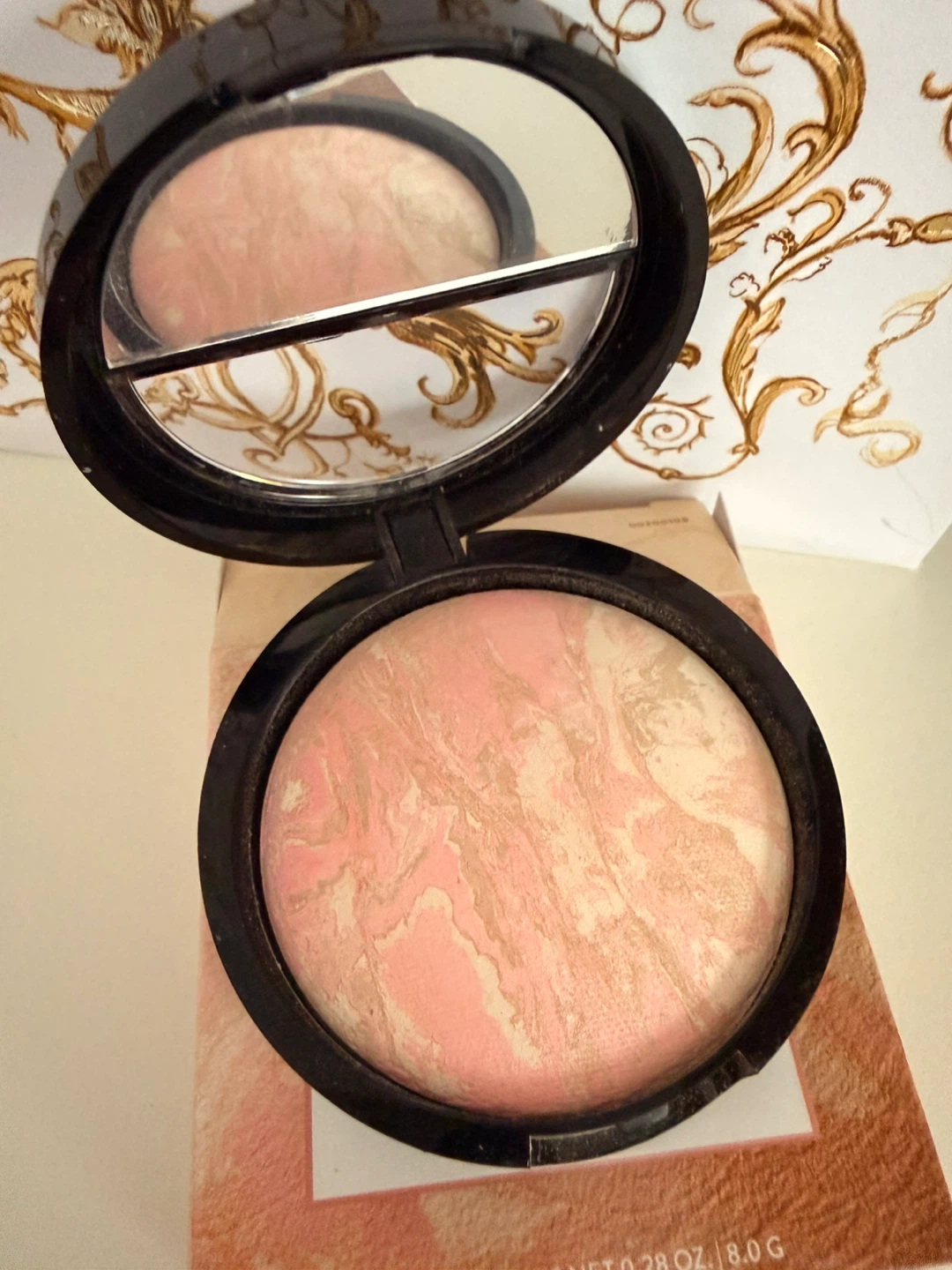 New Laura Geller Baked Foundation in Porcelain color