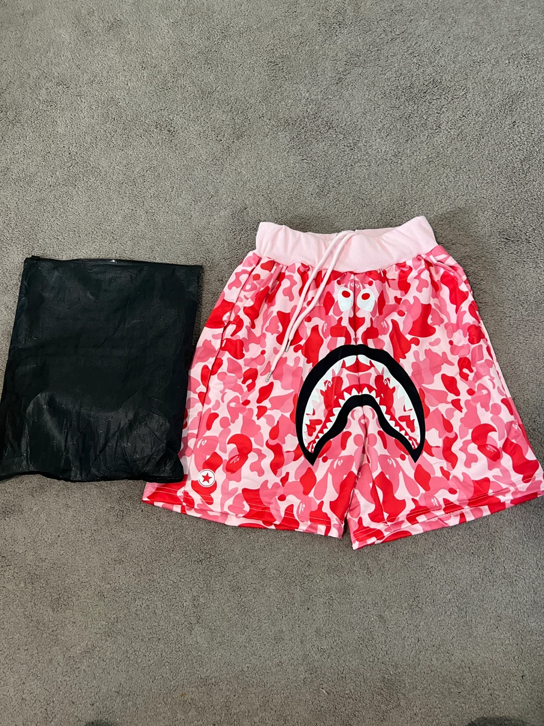 BAPE red camo shorts