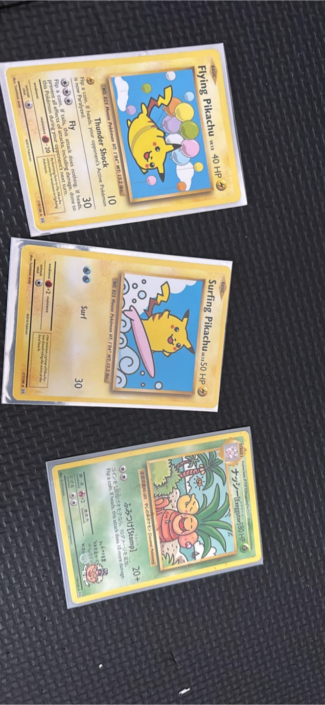 3x Pokemon Cards: Flying Pikachu, Surfing Pikachu, Exeggutor