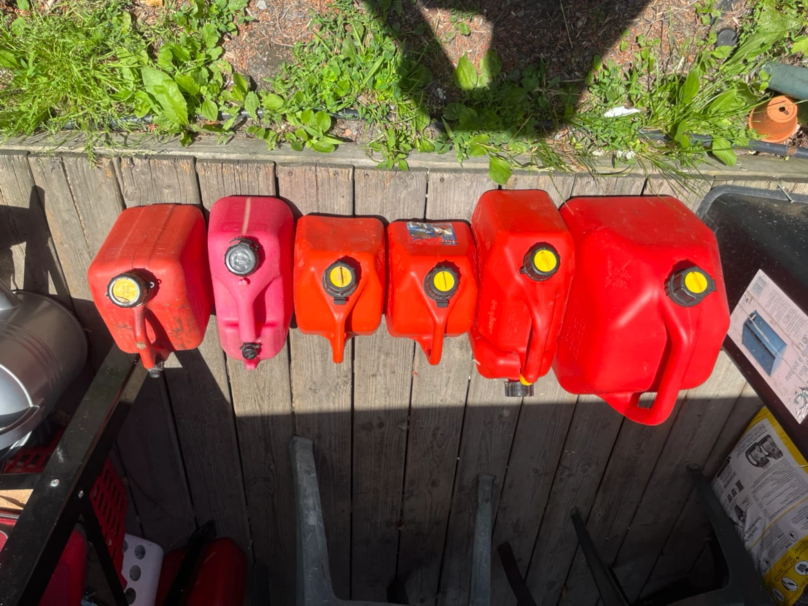 Assorted Red & Pink Gas Cans (5 Gallons Total)