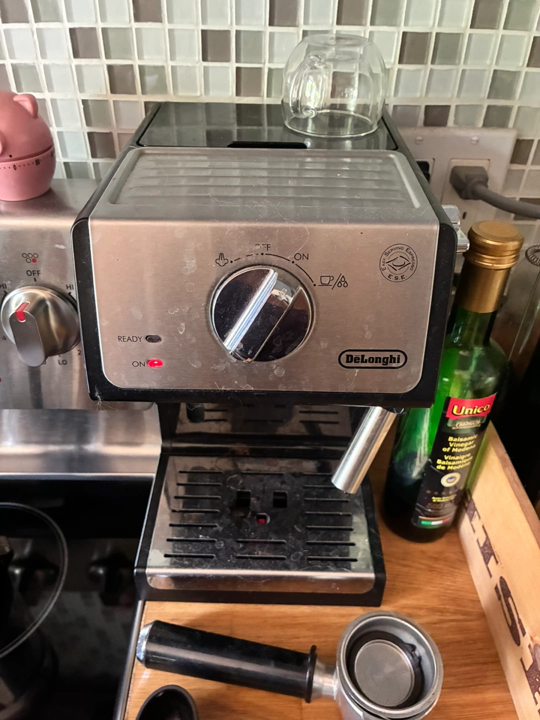 DeLonghi Espresso machine and bottle of descaler - photo 2