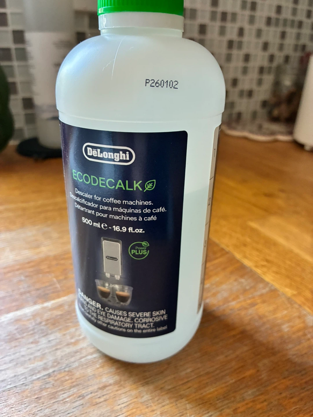 DeLonghi Espresso machine and bottle of descaler - photo 4