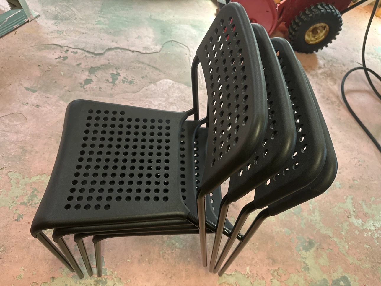 Stackable Black Plastic Chairs (Set of 4)