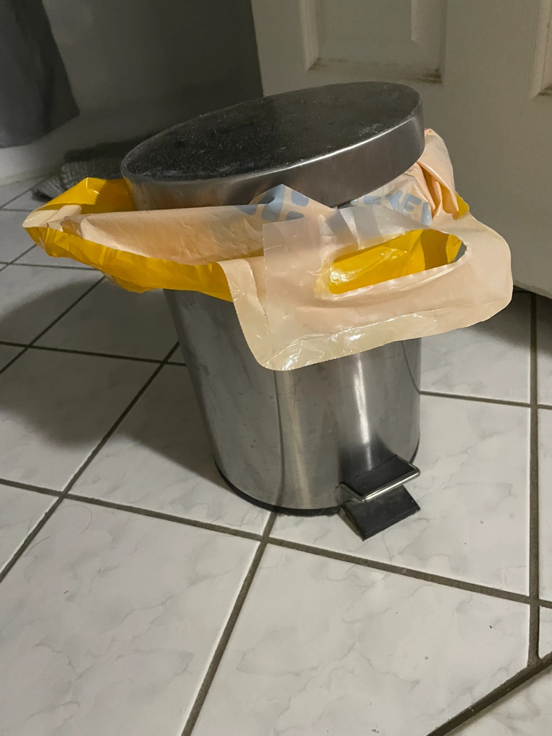 Small trash can with foot pedal