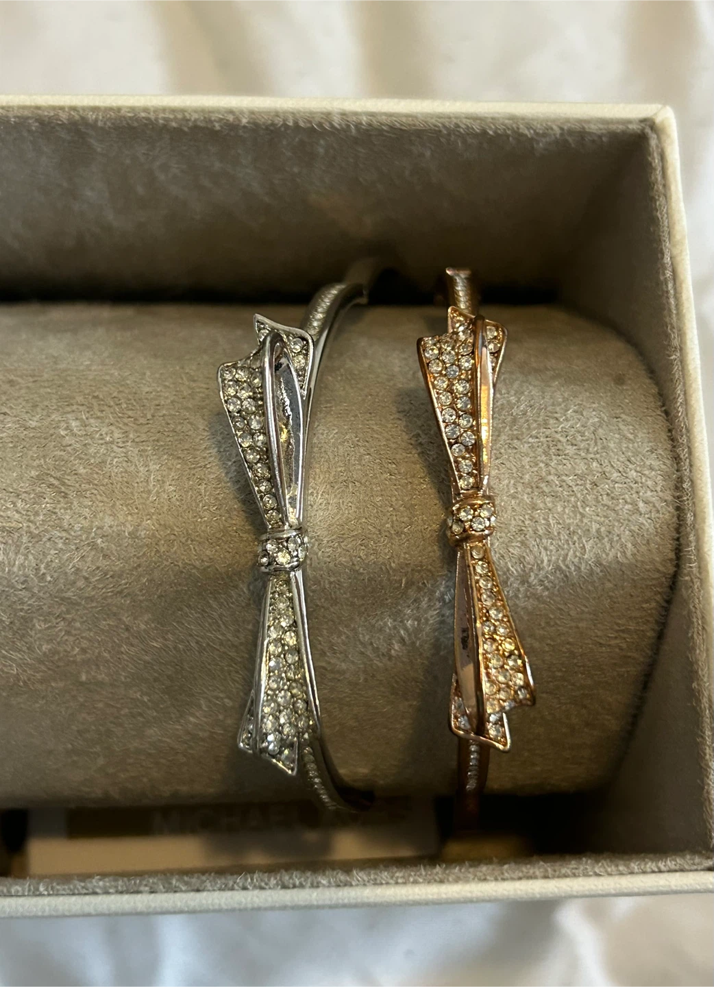 Kate Spade  - Silver and Rose Gold bow bracelets