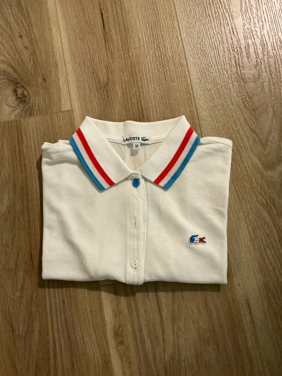 Lacoste White Polo Shirt with Red & Blue Trim - Size 38