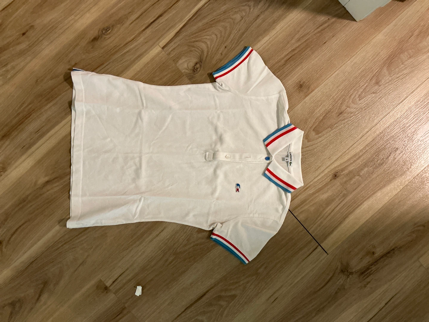Lacoste White Polo Shirt with Red & Blue Trim - Size 38 - photo 2