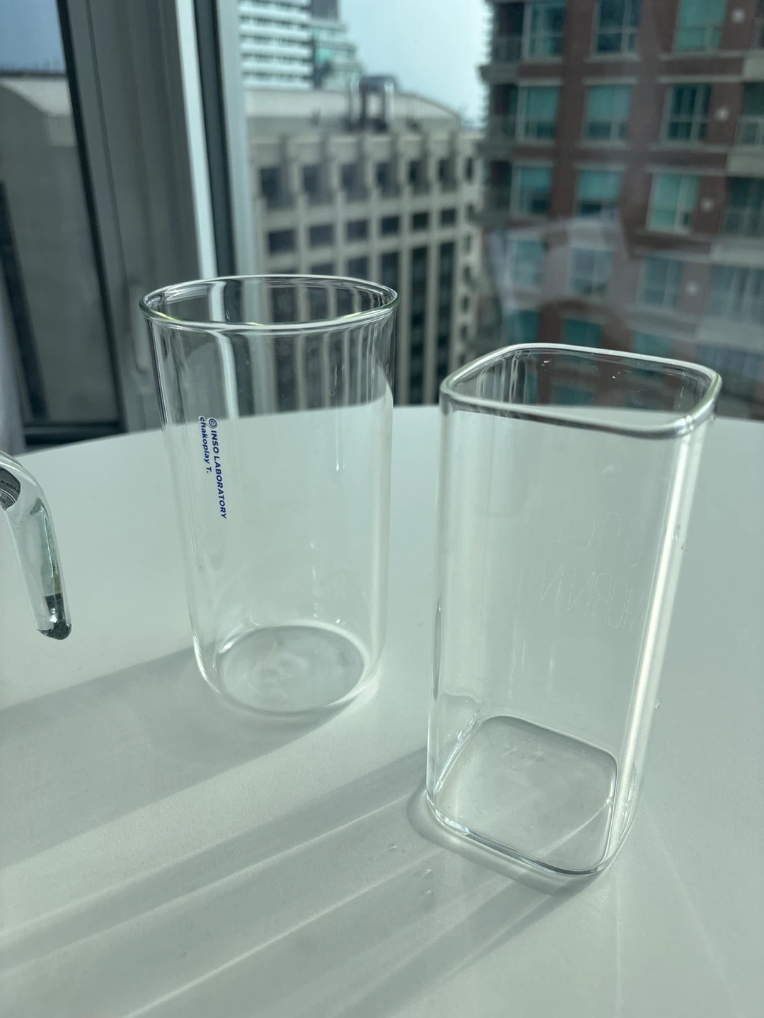 Glass measuring cup, jar, and two glasses - photo 3