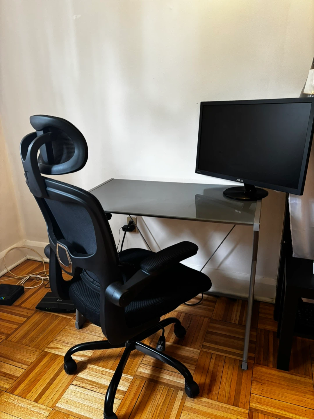 Black Ergonomic Office Chair, desk and monitor