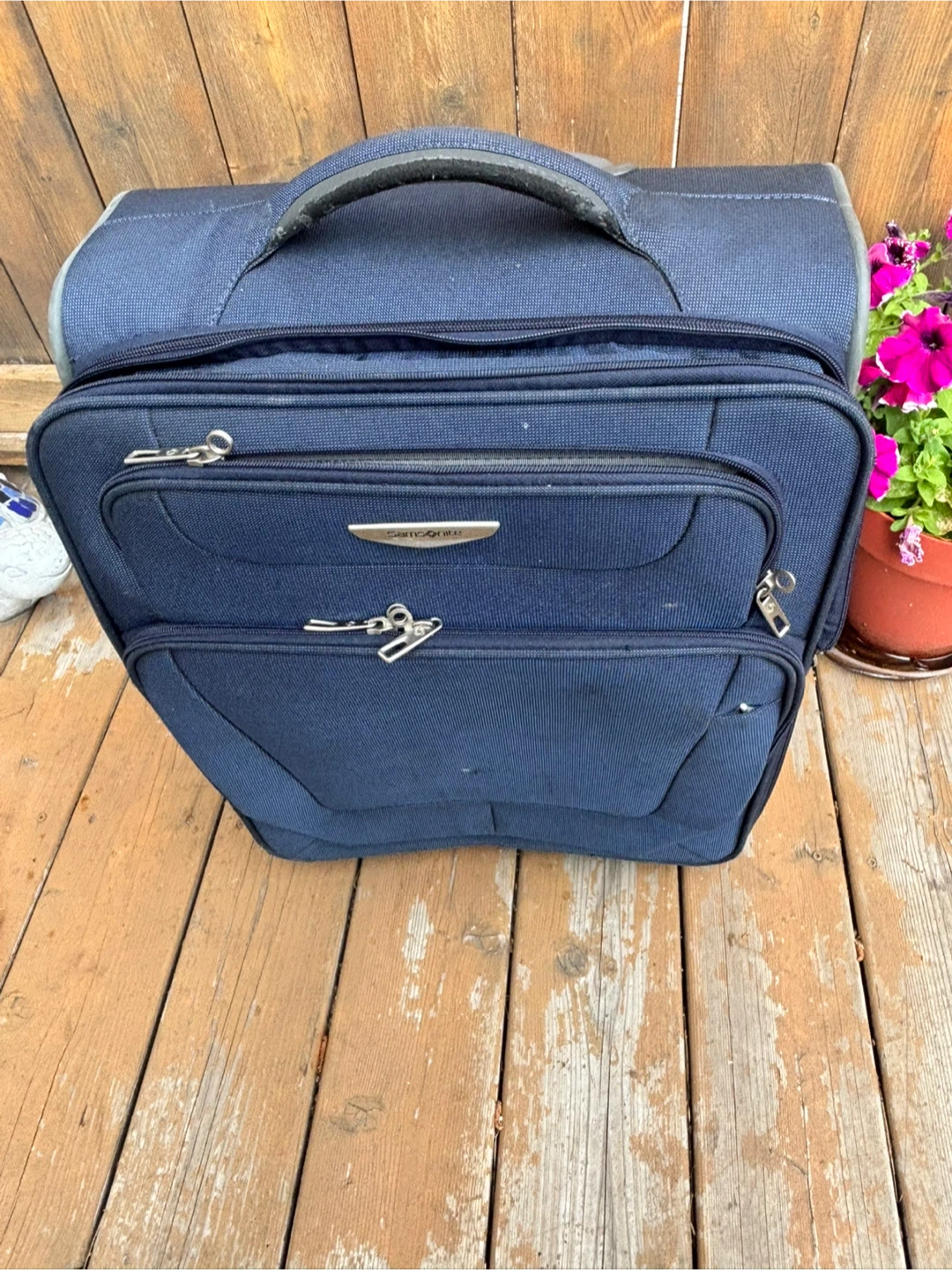 Samsonite Dark Blue Rolling Suitcase