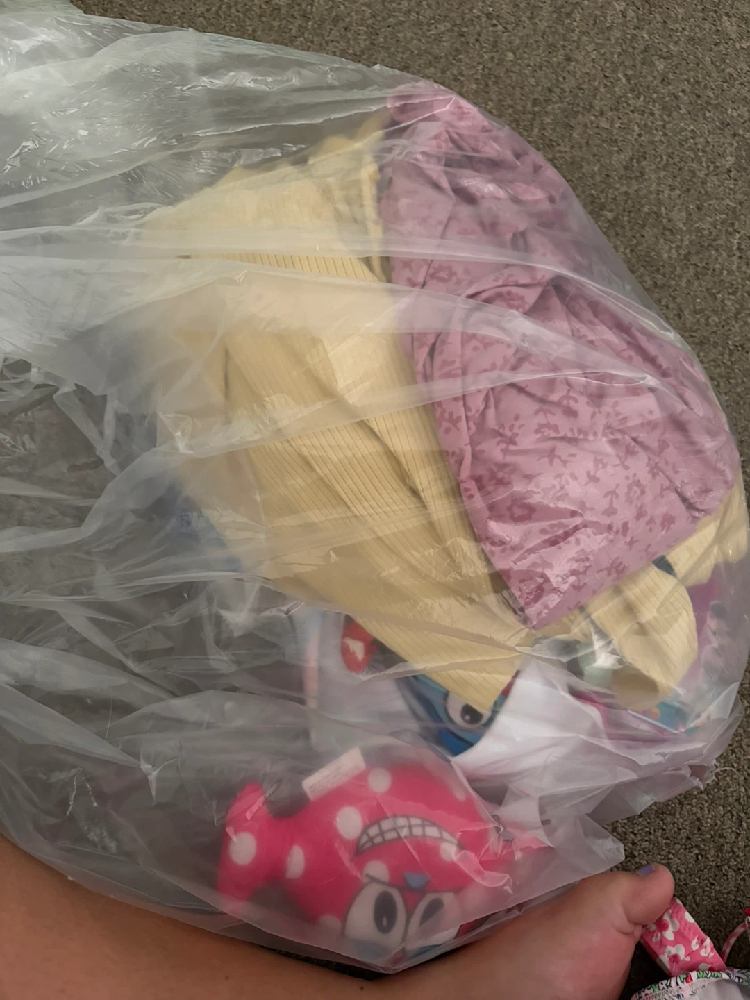 Assorted kids' clothing and toy