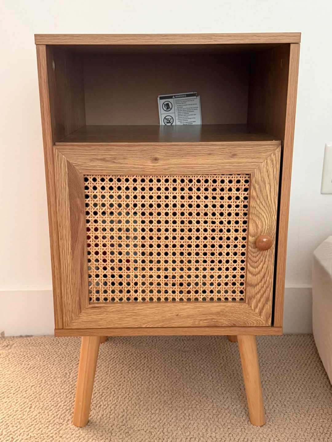 Wooden Nightstand with Cane Door