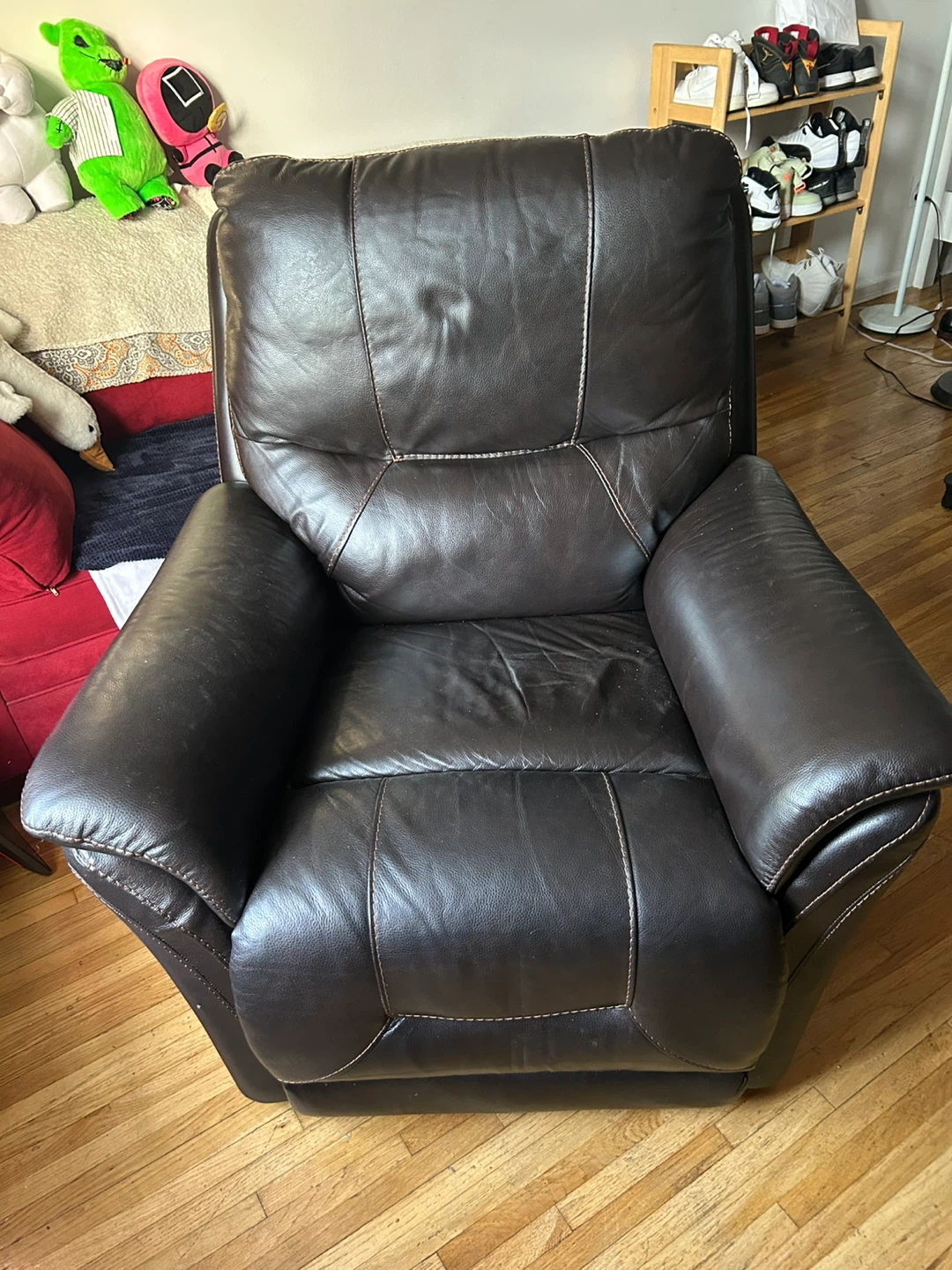 Brown Leather Recliner Chair with cord.