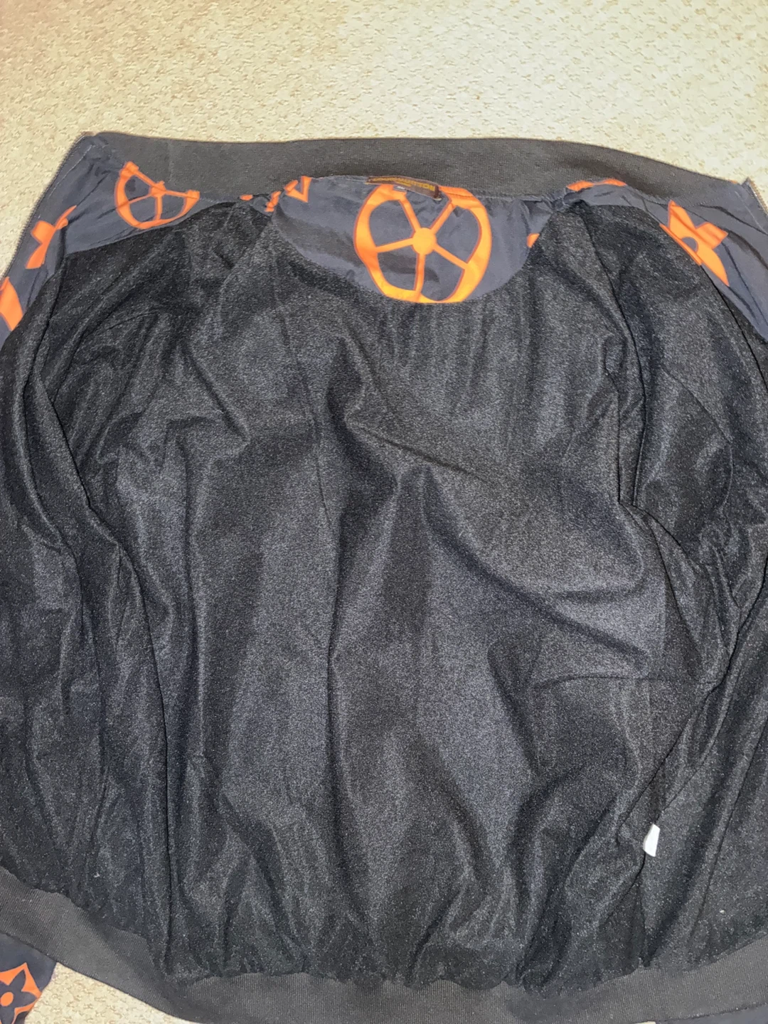 Black Bomber Jacket with Orange Flower and Star Print