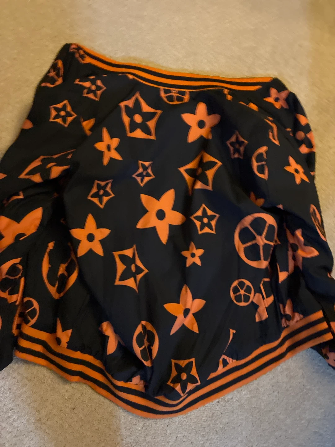 Black Bomber Jacket with Orange Flower and Star Print - photo 2