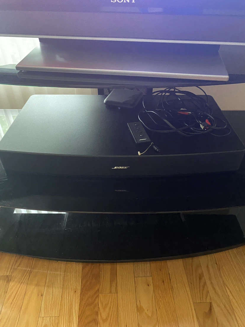 Sony BRAVIA TV with Bose Soundbar and TV Stand