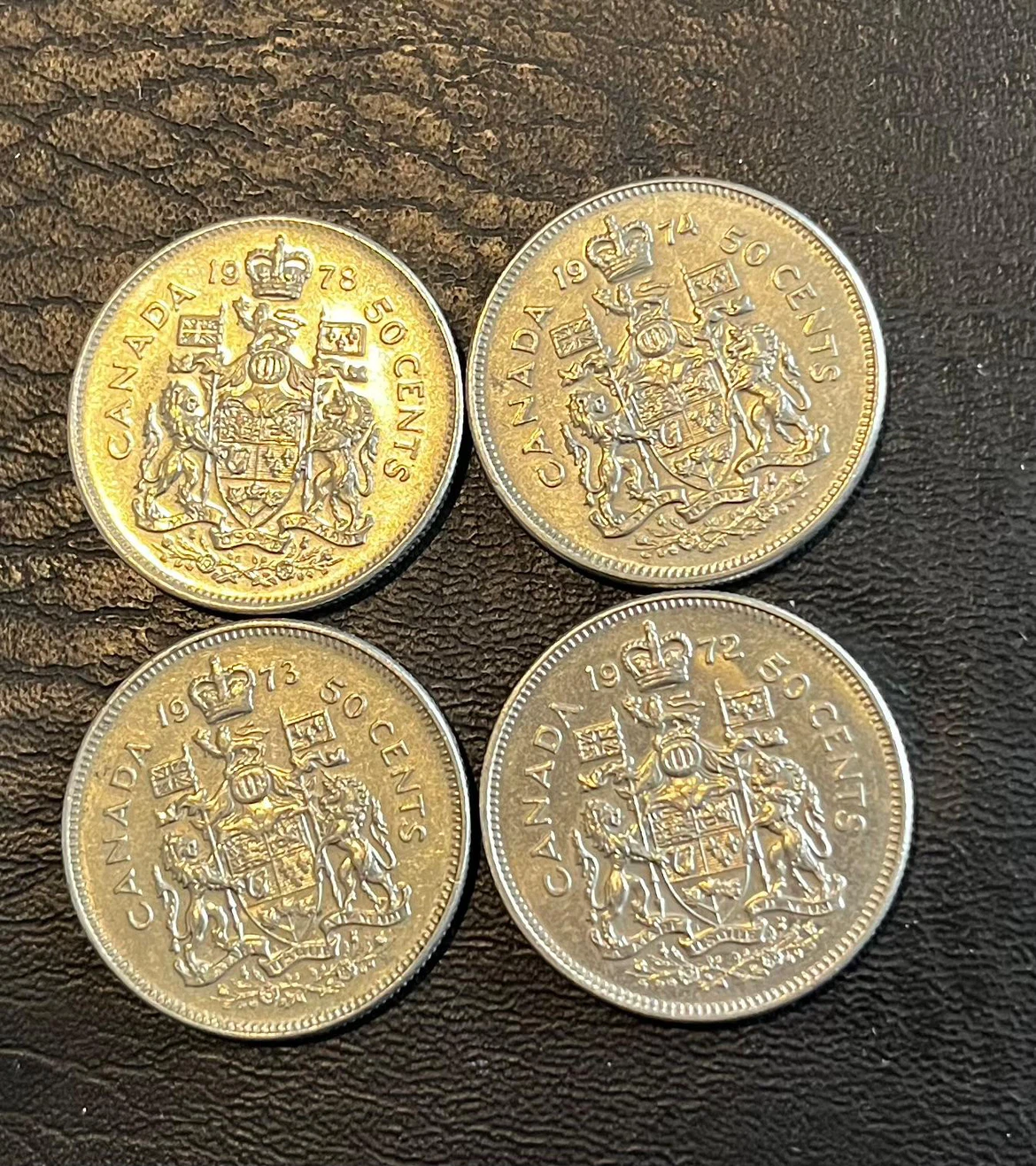 Threes dollar each coin Four Canadian 50 Cent Coins