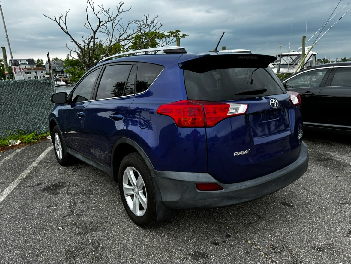 Blue Toyota RAV4 XLE AWD SUV - photo 2