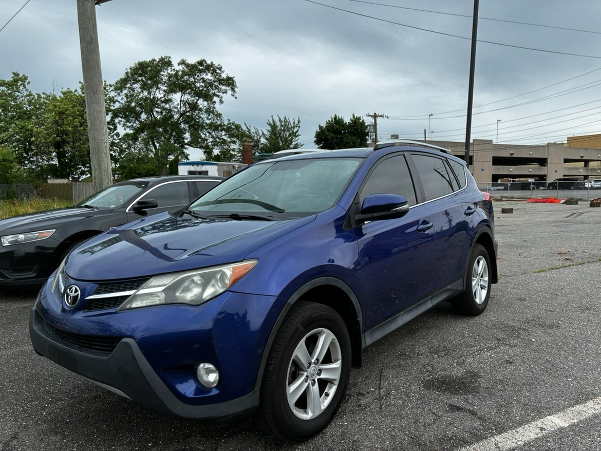 Blue Toyota RAV4 XLE AWD SUV - photo 4