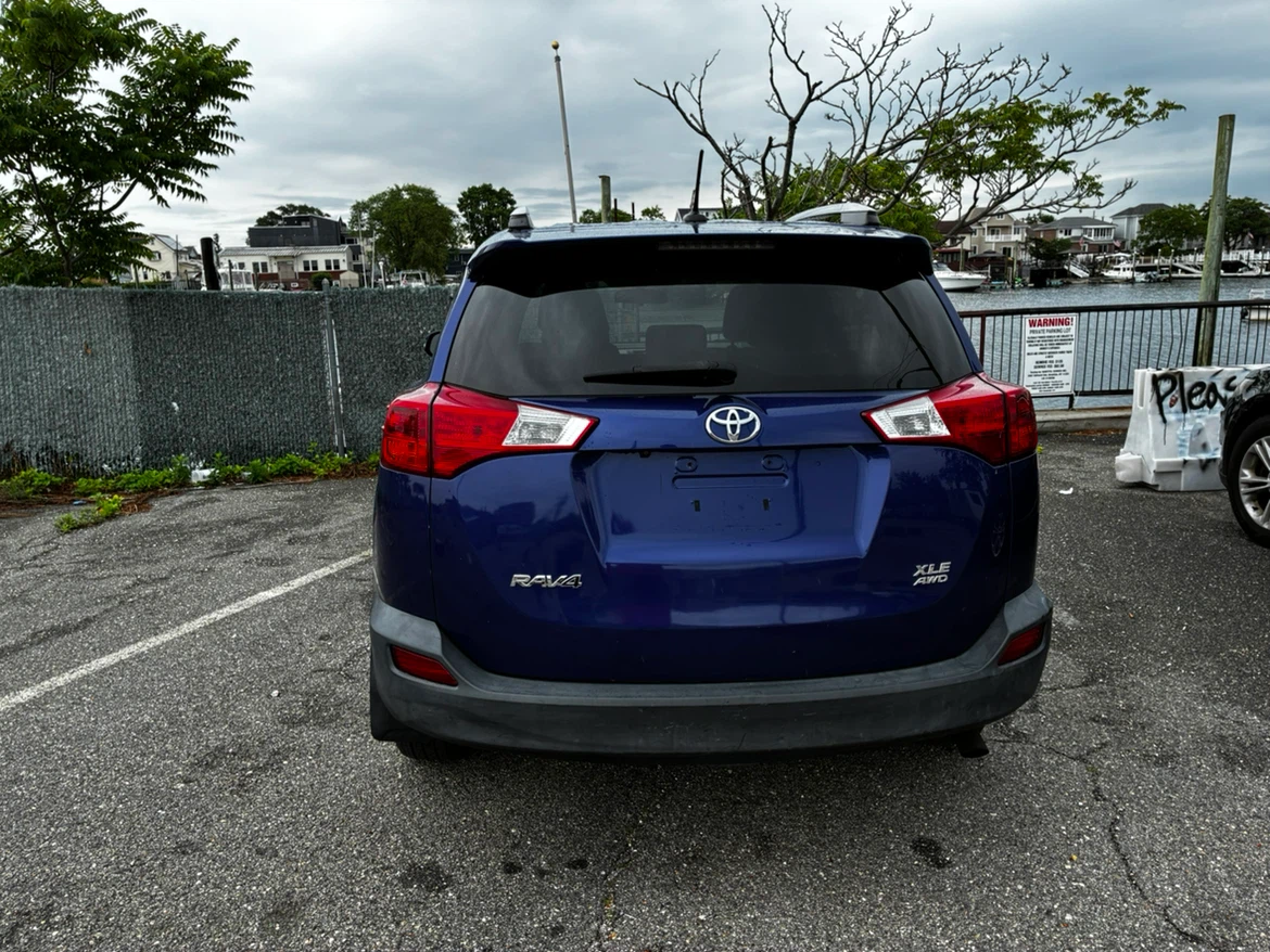 Blue Toyota RAV4 XLE AWD SUV - photo 5