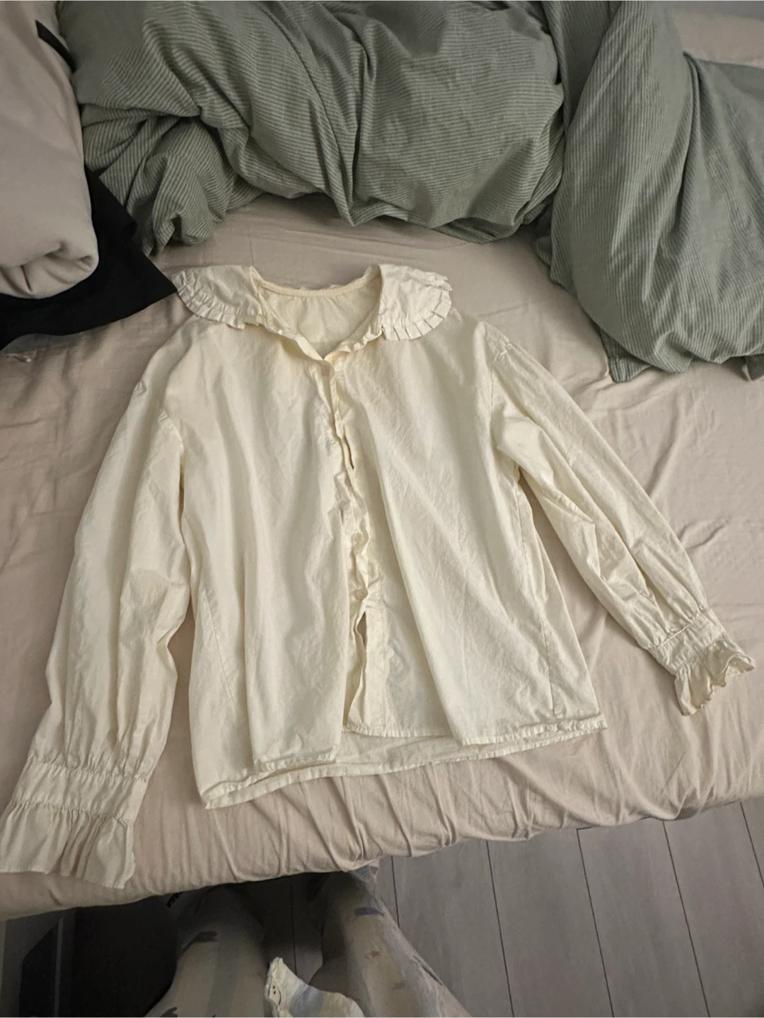Cream long sleeve blouse with ruffled collar