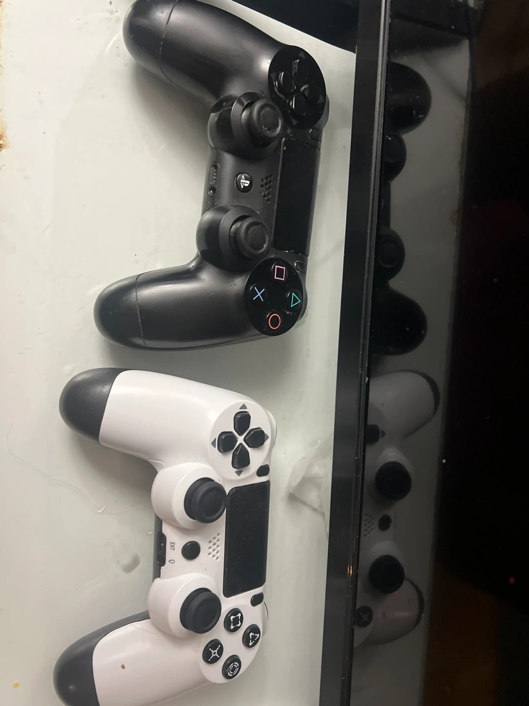 Sony PlayStation 4 DualShock 4 Controllers - Black & White