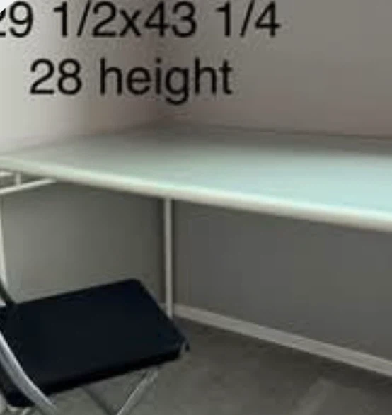 Glass top desk with metal frame