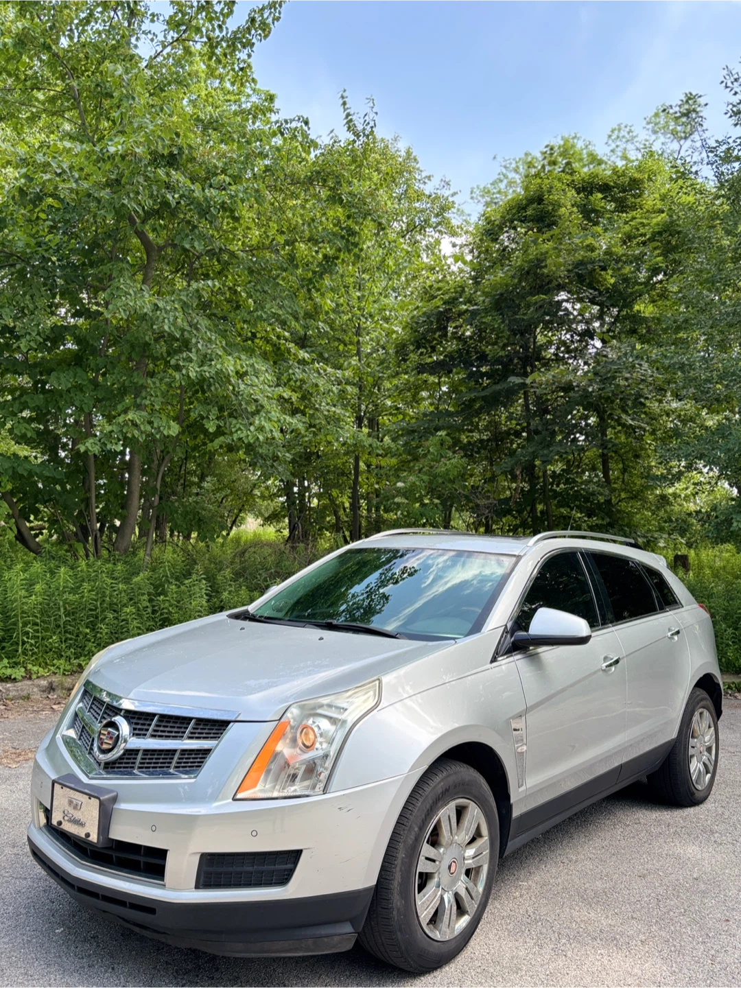 Silver Cadillac SRX SUV - photo 2