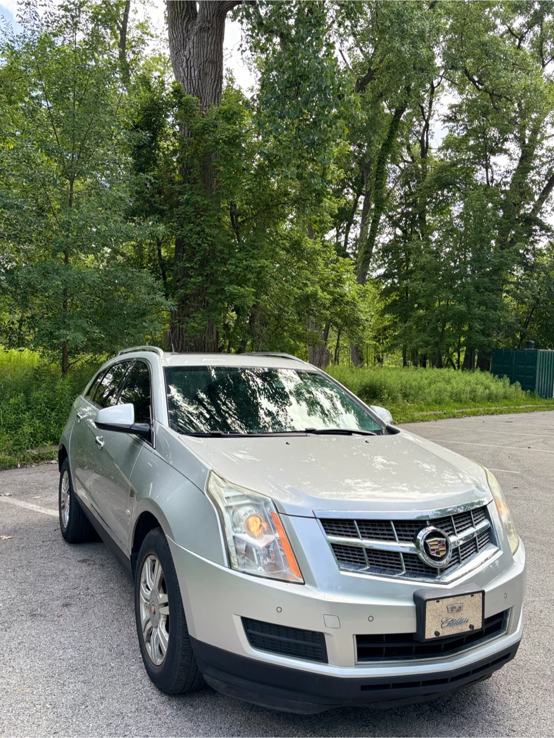 Silver Cadillac SRX SUV - photo 3