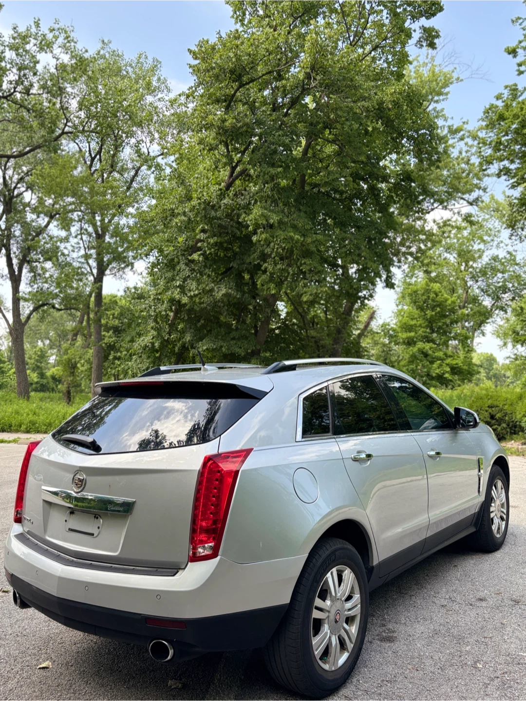 Silver Cadillac SRX SUV - photo 4