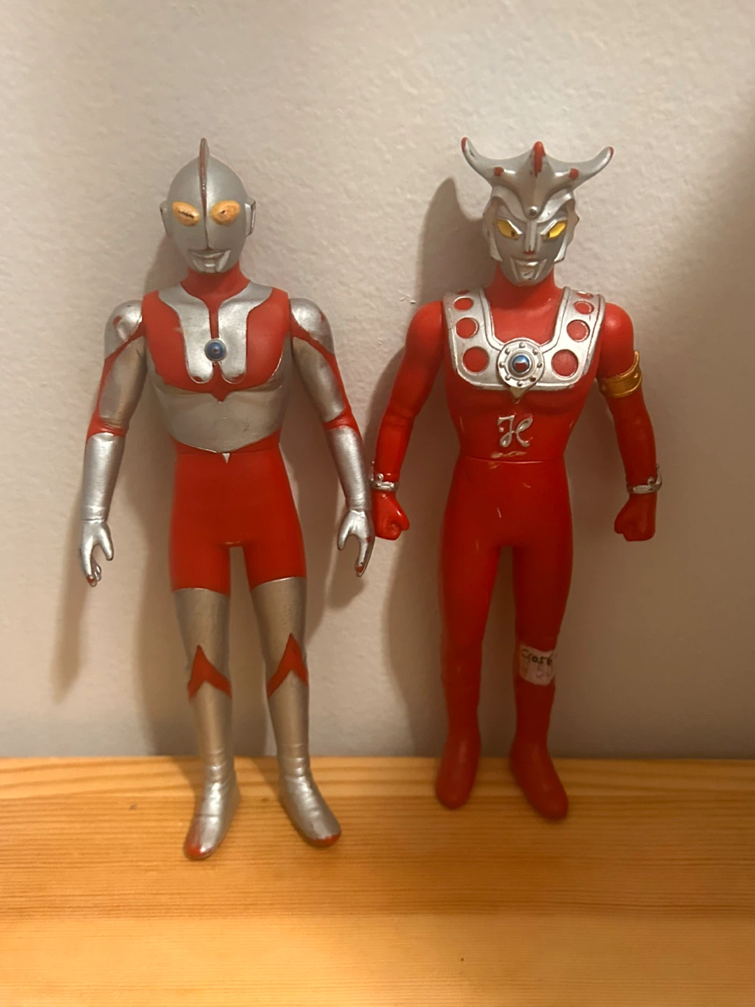 Two Ultraman Action Figures