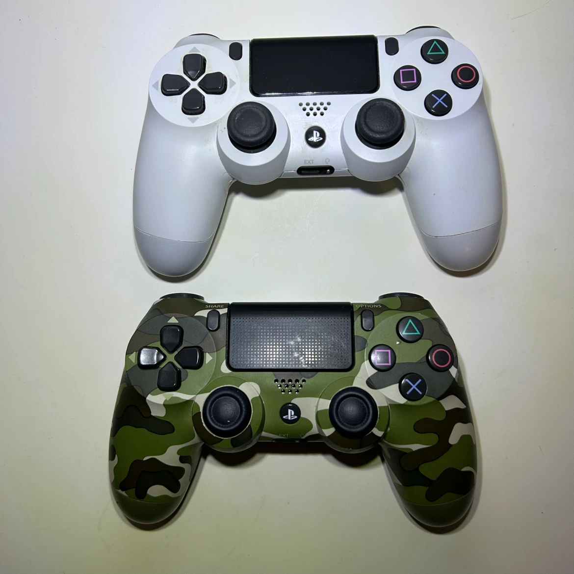 Sony DualShock 4 Controllers (White & Camo)