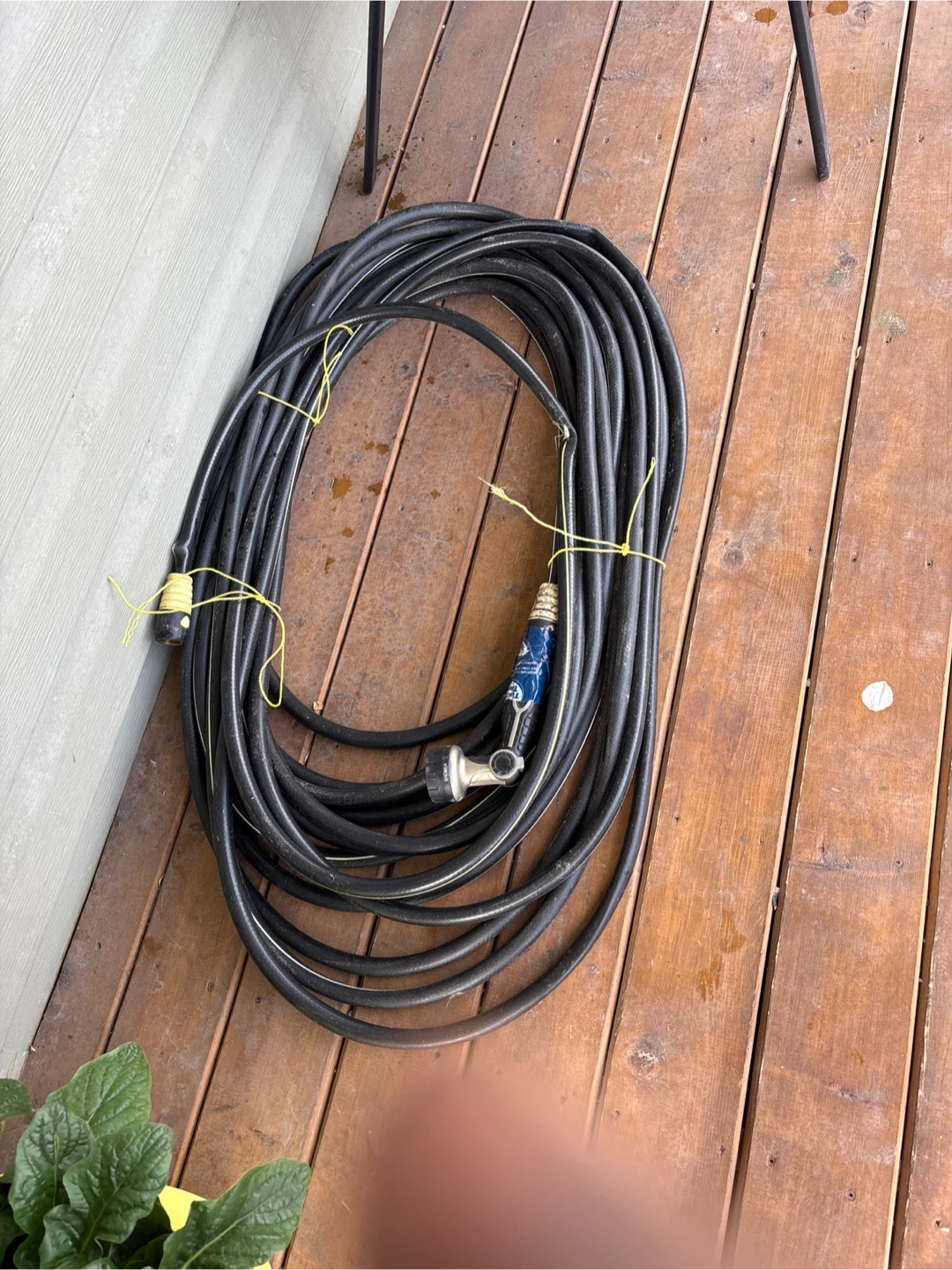 Black Garden Hose with Sprayer Nozzle